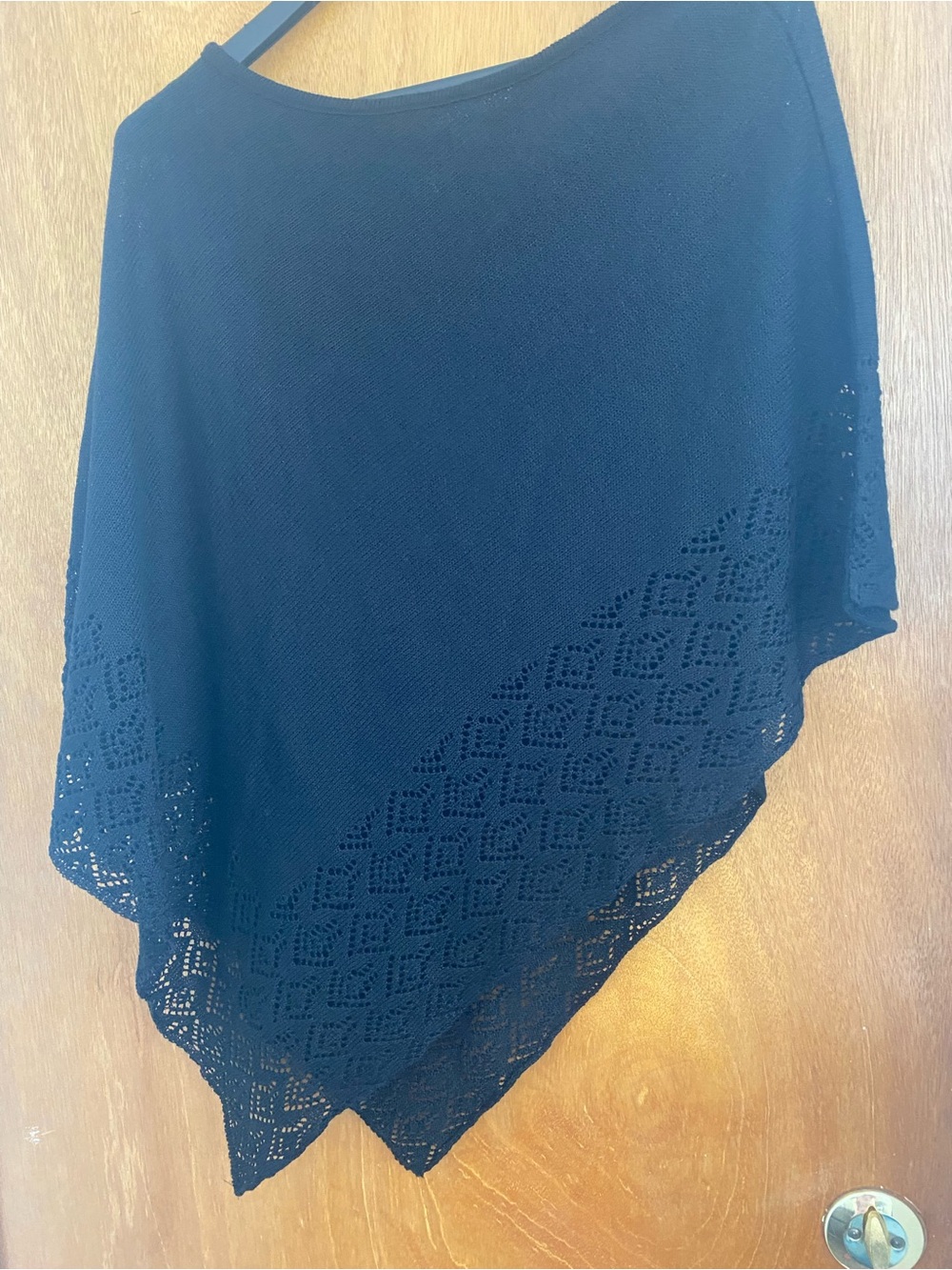 Black poncho top or poncho-style sweater/top n a snake print